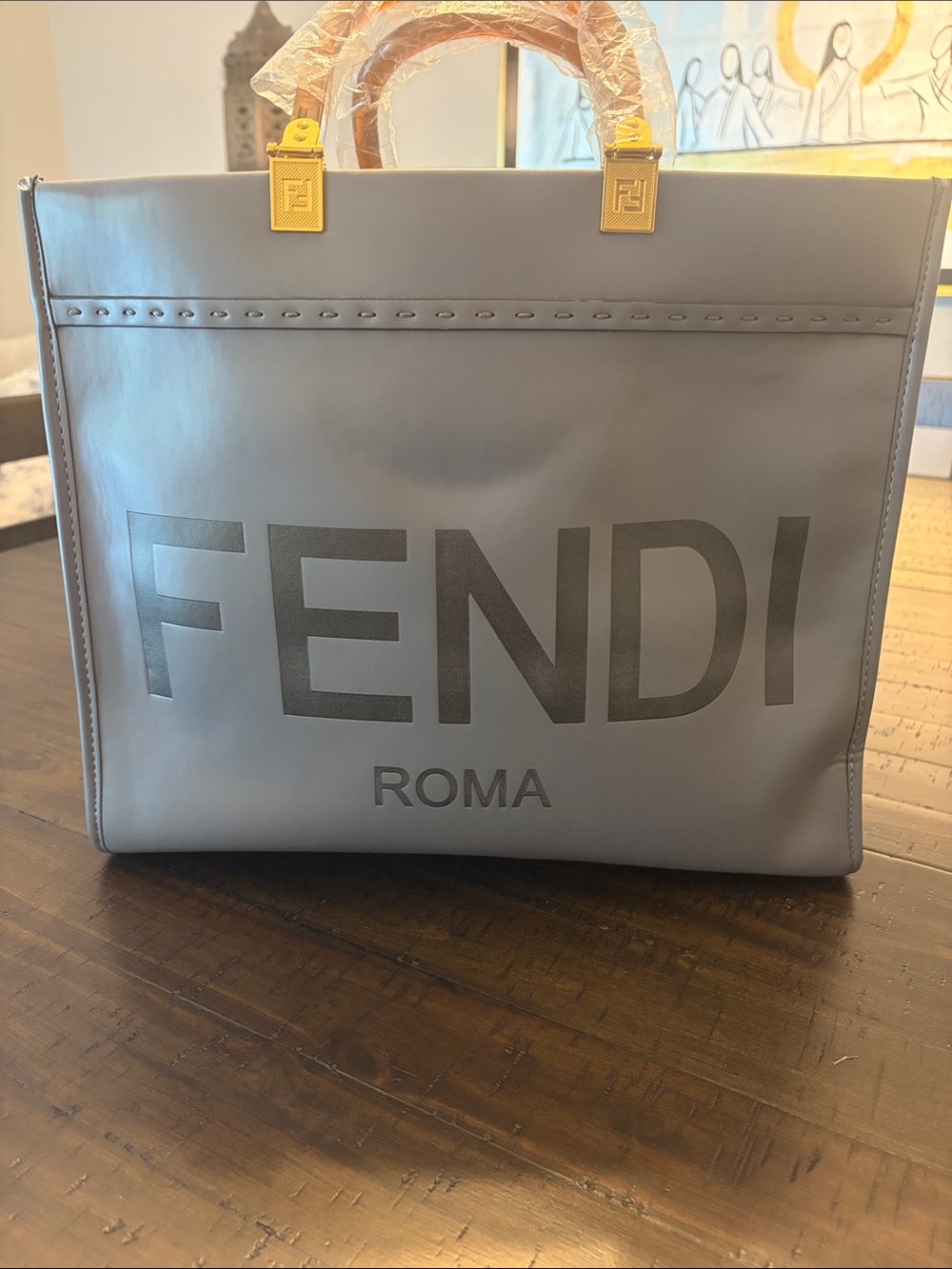 Gray Leather Messenger Bag with Gold Hardware Accents